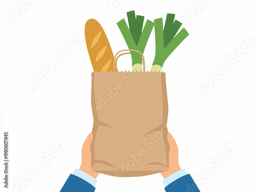 Hands holding brown paper grocery bag with baguette and vegetables