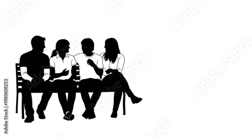 Silhouette of four friends sitting together on a park bench.