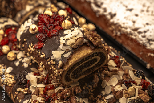 Poppy seed cake with fruit arranged in the refrigerator at the pastry shop, poppy seed cake, sweet desserts baked with homemade methods, food for the holidays, light and healthy desserts made from cak