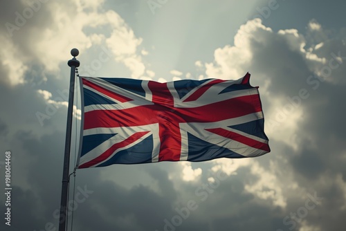British Union Jack Flag Waving Against Dramatic Sky – Hyperrealistic UK National Flag Photo with Cinematic Lighting