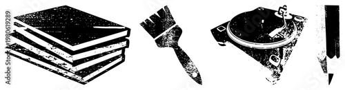 Stacked books, paintbrush, vinyl turntable, pencil artistic tools for writers, artists, musicians, designers, creative professionals.