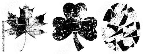 Distressed black stencil graphics of maple leaf, clover, and fragmented circle, ideal for tattoo, print, or branding, with gritty texture and halftone effect.