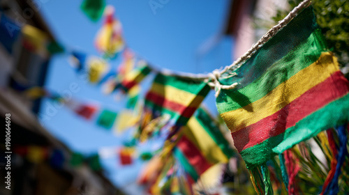 Reggae Simfest, Cannabis leaves attached to string line with reggae colors under clear sky representing cultural symbolism of reggae lifestyle and festival decoration concept