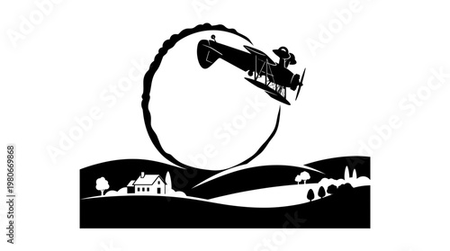 Vintage Biplane Performing Loop Over Rural Landscape Silhouette