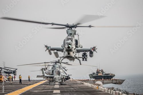 STRAIT OF HORMUZ U.S. Navy and Coast Guard ships participates in a photo exercise while transiting the Strait of Hormuz,  Sioux City is deployed to the U.S. 5th Fleet area of operations to help ensure