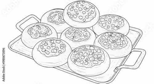 Tray of freshly baked round buns, topped with diced pieces