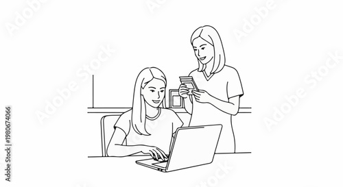 Two women collaborate on a laptop, one holding cards