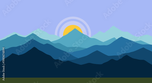 Layered mountain ridges with sunrise over distant peaks