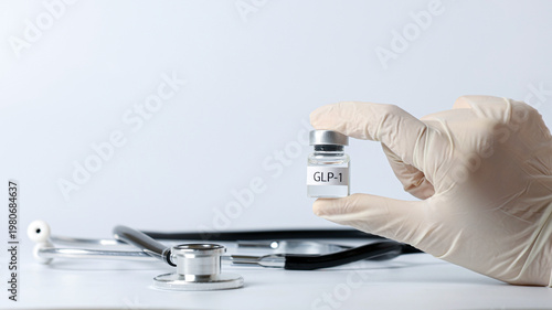 Obraz na plátně Professional doctor hand holds glp1 vial for hopeful medical weight management t