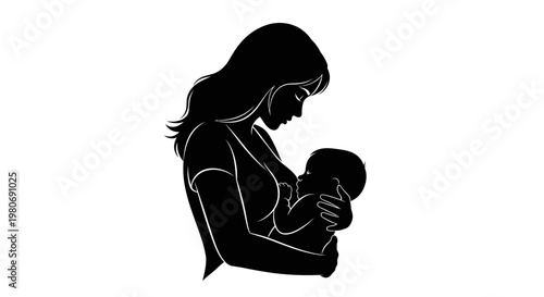 Silhouette of a mother breastfeeding her newborn baby.