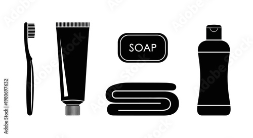 Black and white bathroom toiletries set.