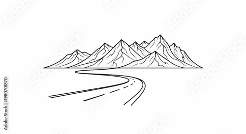 Winding road leads to majestic mountain range