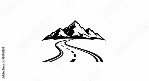 Winding road leads to majestic, snow-capped mountains