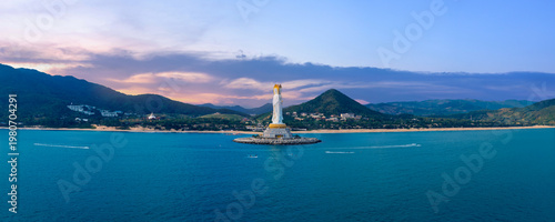 Photography GuanYin buddhism statue at seaside in Nanshan center of Sanya, Hainan island Chi