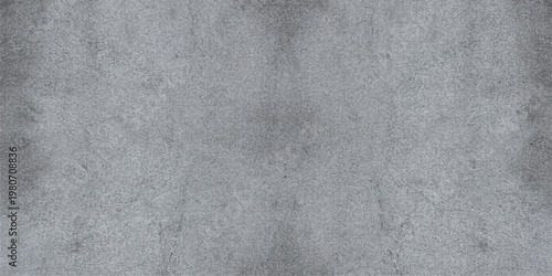 A blank textured gray concrete wall with a rough cement surface and grunge stone pattern creates a vintage backdrop for design