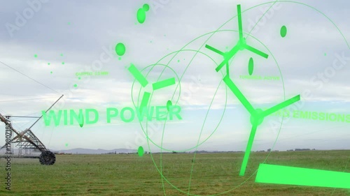 AR wind turbine graphics appearing over farm, expanding with rings and showing ZERO EMISSIONS label
