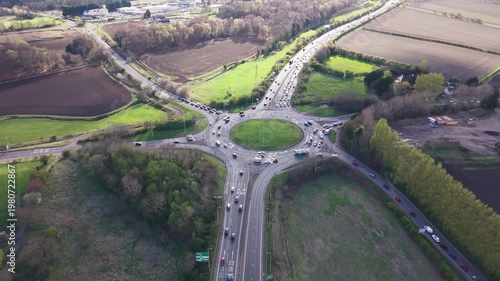 Complex multi-lane road infrastructure and transport hub at the Sheriffhall Roundabout. Detailed perspective of the massive highway intersection and traffic system on the Edinburgh City Bypass corrido