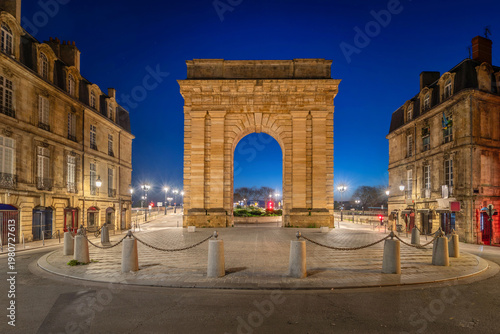 Bordeaux, France - view of Porte de Bourgogne arch city gate at dusk