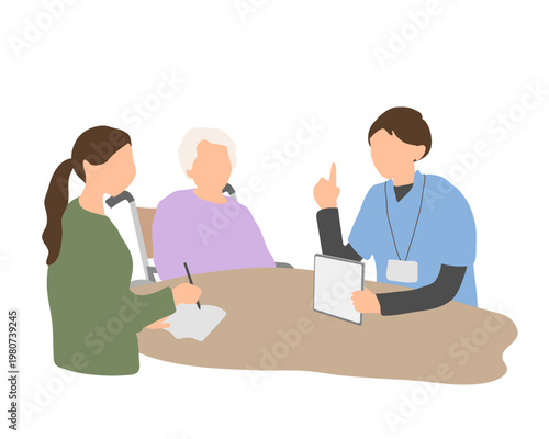 介護サービスの説明を受ける家族とケアマネージャーの相談シーン