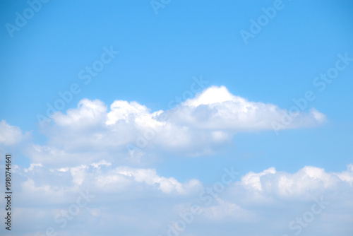 Beautiful clear blue sky with puffy white clouds. Thick cloud cluster. Relaxing view, beautiful day. Good weather condition.
