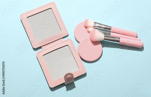 Konstfotografi Set of makeup products on a blue background