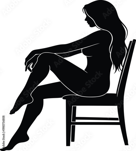 Silhouette of a woman seated in contemplative pose