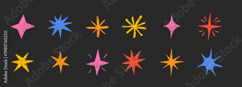 Doodle hand drawn stars crayon color sparkles set on blackboard. Scribble texture freehand childlike chalk or pencil drawing sketch. Celestial elements with rough edge 