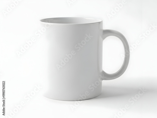 A simple white ceramic mug on a white background with a handle on the right side