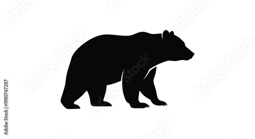 A striking black silhouette of a bear walking powerfully defined silhouette