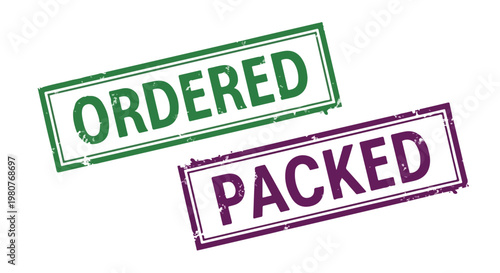 Close-up of two rubber stamps marked ordered and packed in green and purple ink for shipping process