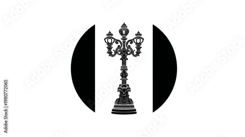 Black and white illustration of an ornate streetlight within a circular frame on a white background