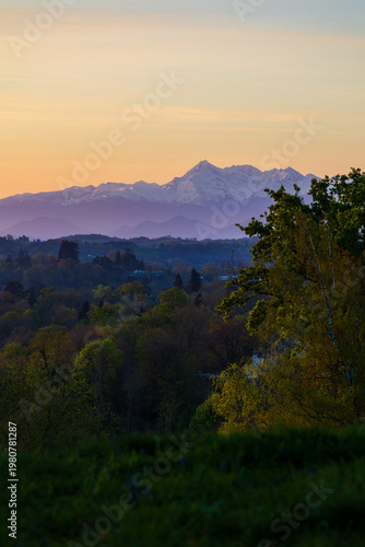 Snow-capped Pyrenees peaks in spring including the Pic du Midi de Bigorre at sunrise from the heights of Jurançon