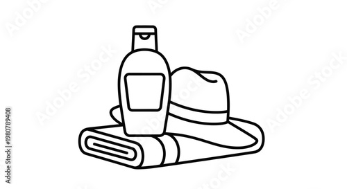 Sunscreen bottle and hat on towel.