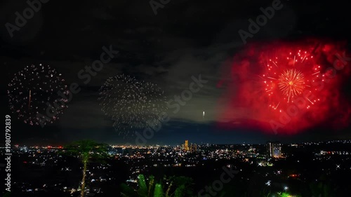 New Year Celebration Fireworks Over Suburban Cityscape