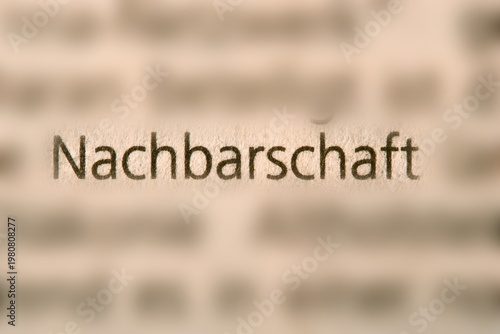Quadro em tela Der Begriff  Nachbarschaft  in der Zeitung gedruckt und durch Umgebungsunschär