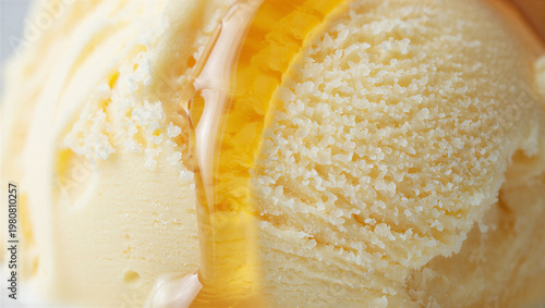 Photos Close up of vanilla ice cream with golden honey drizzled over it food photograph