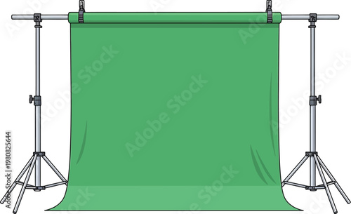 Backdrop stands hold a green screen for professional video post production.