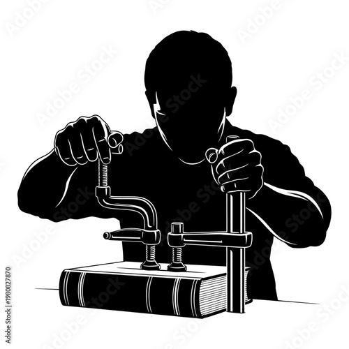 Man operating vintage metal press machine on book