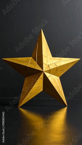 A shiny gold star sculpture on a dark floor