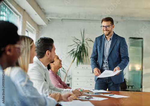 Group of young business people having a meeting or presentation and seminar n the office. Portrait of a young business man leader