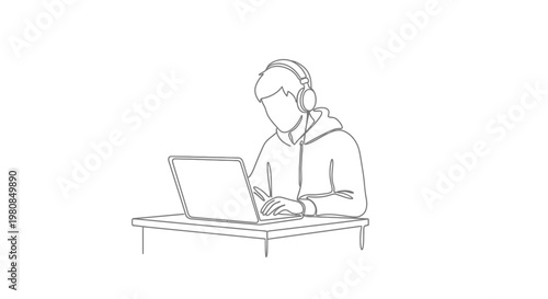Young man wearing headphones working laptop.