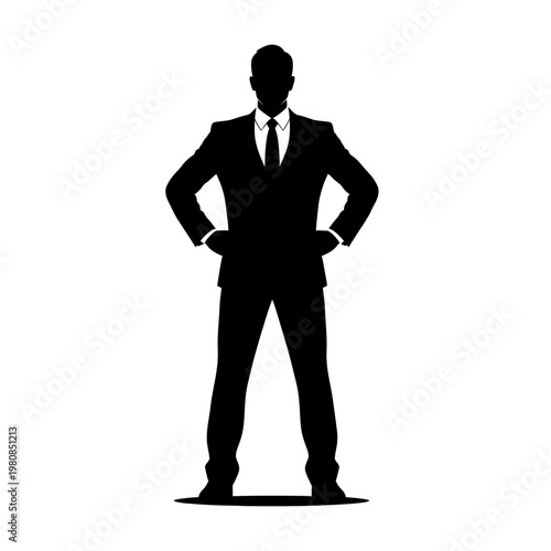 Silhouette of a Confident Businessman Standing with Hands on Hips.