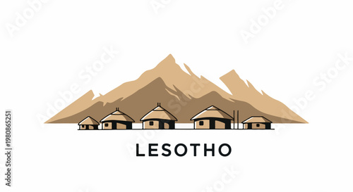 African village huts with thatched roofs nestled below brown mountains