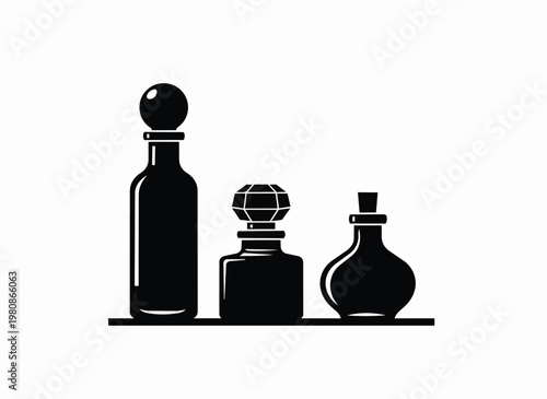 Three ornate perfume bottles with decorative stoppers lined up on shelf in black silhouette.