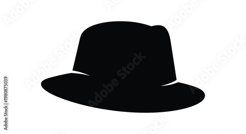 A striking black fedora hat is displayed as a dark dramatic silhouette