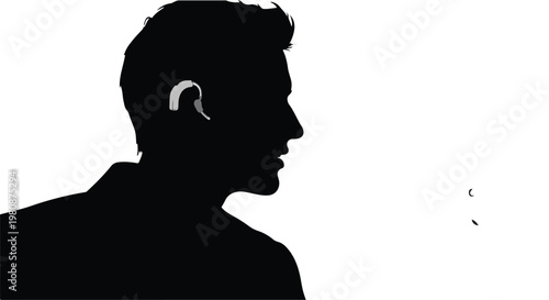 Silhouette of a man wearing a hearing aid for hearing impairment and accessibility concept