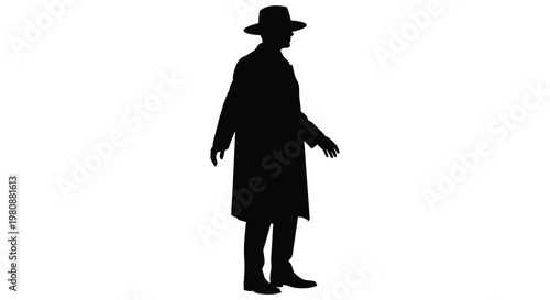 A solitary figure in a coat and hat captured in striking silhouette