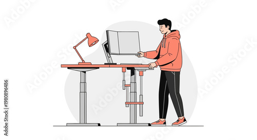 Man working at a standing desk with computer and lamp, modern office setup