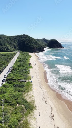 Beach, Ocean and City Skyline Surrounded by Nature