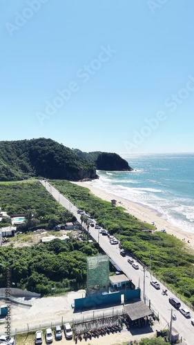Beach, Ocean and City Skyline Surrounded by Nature